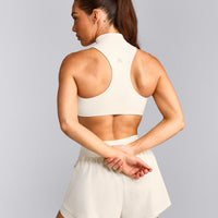 EasyLift™ Zip High Neck Sports Bra with Grey Logo | Marshmallow White