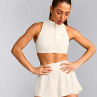 EasyLift™ Zip High Neck Sports Bra with Grey Logo | Marshmallow White