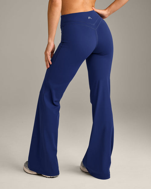 UnifiedMove™ Wrap Flared Bottoms with Reflective Logo | Varsity Blue