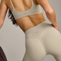 SoftMotion™ 3/4 Length Leggings with Grey Logo | Oatmeal