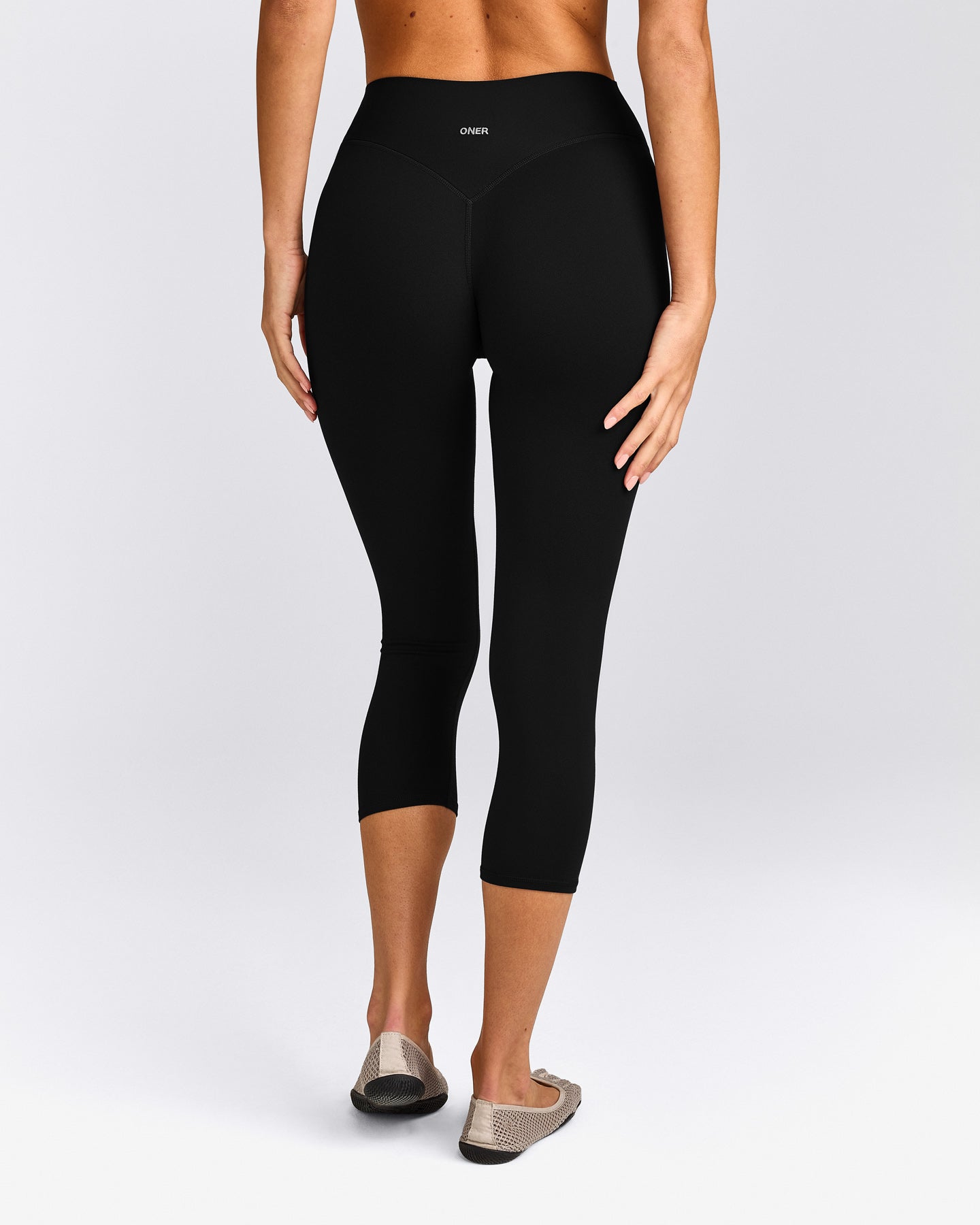 SoftMotion™ 3/4 Length Leggings with Grey Logo | Black