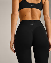 SoftMotion™ 3/4 Length Leggings with Grey Logo | Black