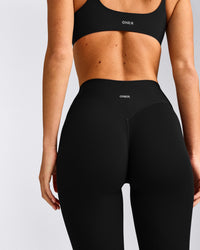 SoftMotion™ 3/4 Length Leggings with Grey Logo | Black