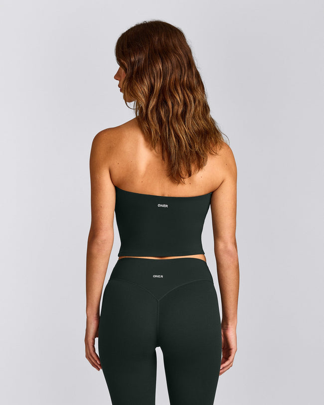 SoftMotion™ Bandeau Mid Vest with Built in Bra Shelf with Grey Logo | Emerald Noir