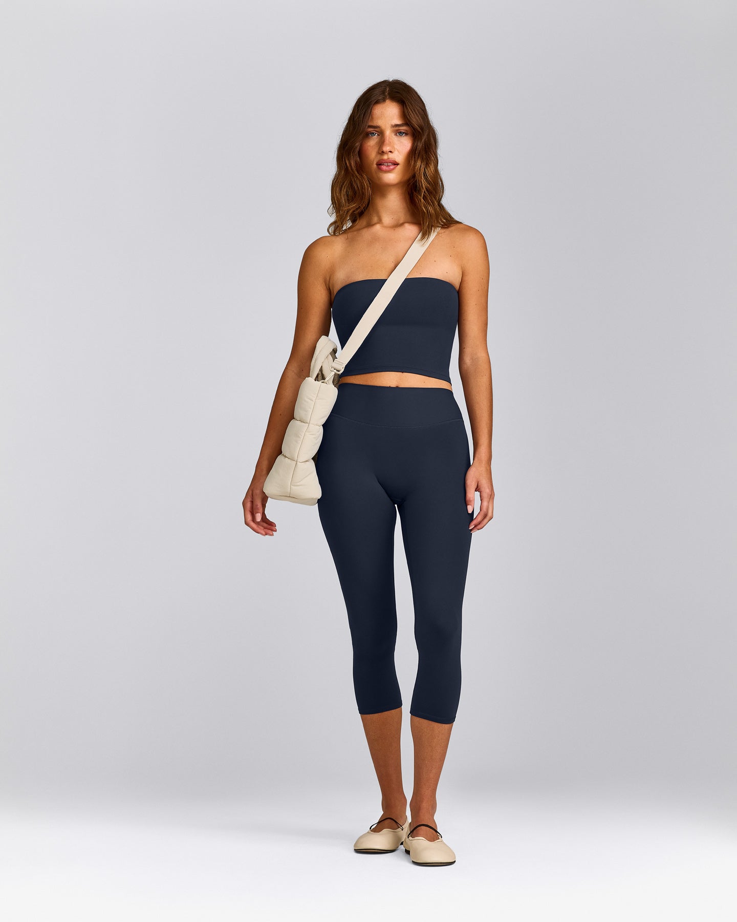 SoftMotion™ Bandeau Mid Vest with Built in Bra Shelf with Grey Logo | True Blue