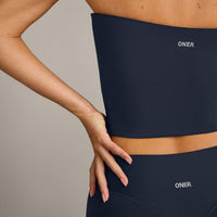 SoftMotion™ Bandeau Mid Vest with Built in Bra Shelf with Grey Logo | True Blue