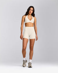 SoftMotion™ Double Layer High Waisted Shorts 6" with Grey Logo | Marshmallow White