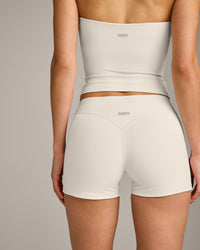SoftMotion™ Double Layer Mid Rise Shorts 4" with Grey Logo | Marshmallow White