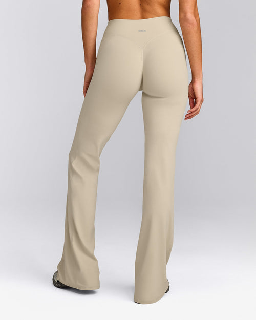 SoftMotion™ Flared Trousers with Gray Logo | Oatmeal