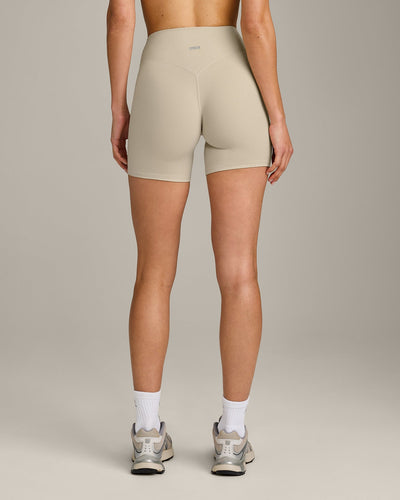 SoftMotion™ High Waisted Shorts 6" with Grey Logo | Oatmeal