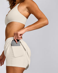 SoftMotion™ Skort with Pockets with Grey Logo | Marshmallow White