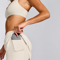 SoftMotion™ Skort with Pockets with Grey Logo | Marshmallow White