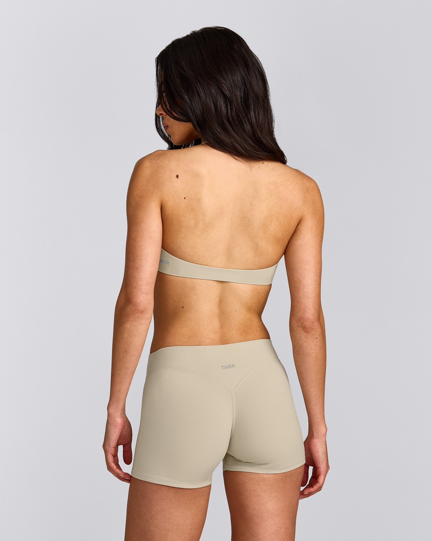 SoftMotion™ Minimal Halter Neck Bralette with Grey Logo | Oatmeal