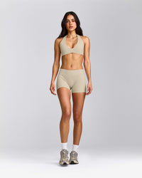 SoftMotion™ Minimal Halter Neck Bralette with Grey Logo | Oatmeal