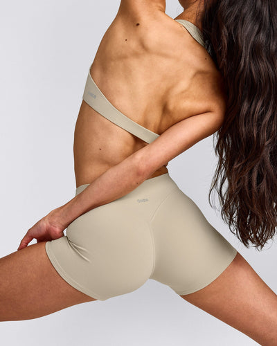SoftMotion™ Minimal Halter Neck Bralette with Grey Logo | Oatmeal