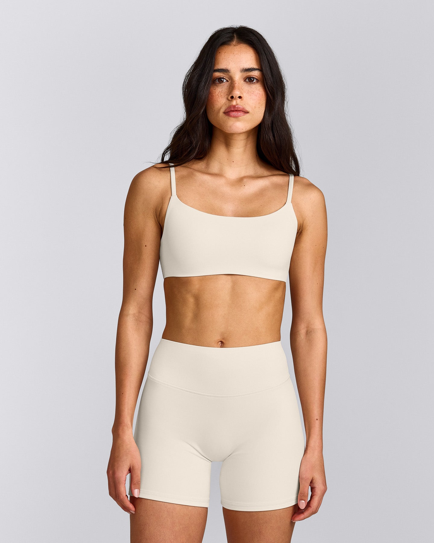 SoftMotion™ Strappy Sports Bra with Grey Logo | Marshmallow White