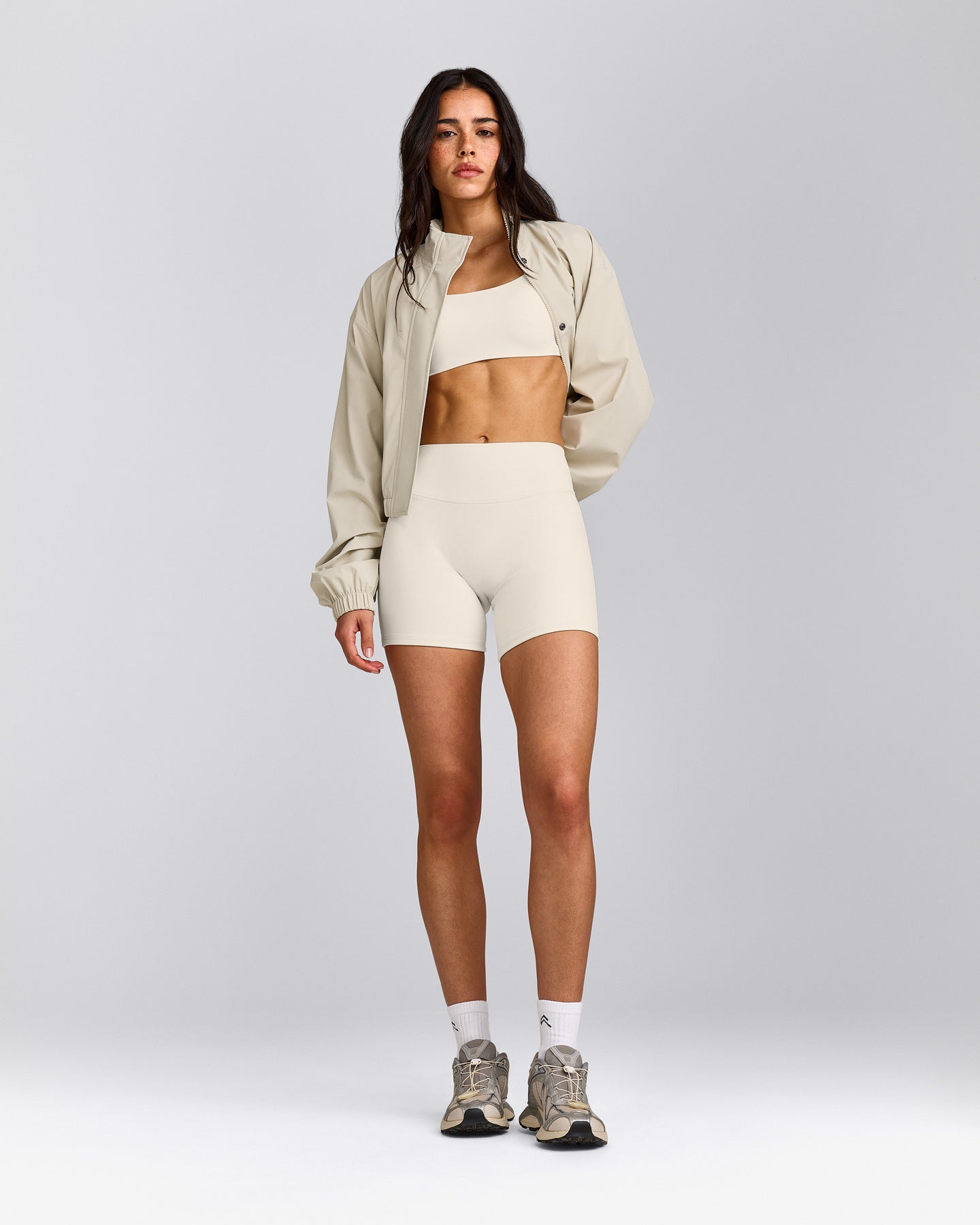 SoftMotion™ Strappy Sports Bra with Grey Logo | Marshmallow White