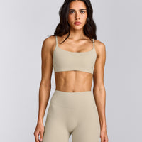 SoftMotion™ Strappy Sports Bra with Grey Logo | Oatmeal