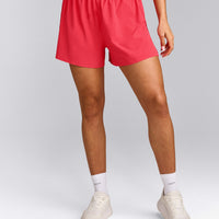AirMove™ Lined Shorts 4" with Pocket and Reflective Logo | Charged Pink