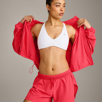 AirMove™ Lined Shorts 4" with Pocket and Reflective Logo | Charged Pink