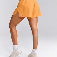 AirMove™ Lined Shorts 4" with Pocket and Reflective Logo | Powdered Orange