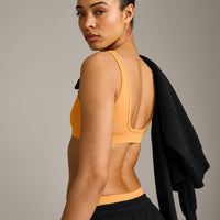 EffortlessLift™ Square Neck Sports Bra with Grey Logo | Powdered Orange