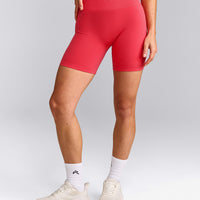 EffortlessLift™ Seamless Mid Rise Shorts with Gray Logo | Charged Pink
