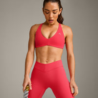 UnifiedMove™ Cross Back Sports Bra with Reflective Logo | Charged Pink