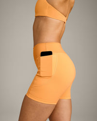 UnifiedMove™ Pocket Shorts 6" with Bonding with Reflective Logo | Powdered Orange