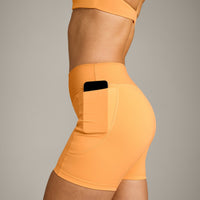 UnifiedMove™ Pocket Shorts 6" with Bonding with Reflective Logo | Powdered Orange