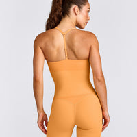 UnifiedMove™ T Back Mid Vest with Built in Bra Shelf with Reflective Logo | Powdered Orange