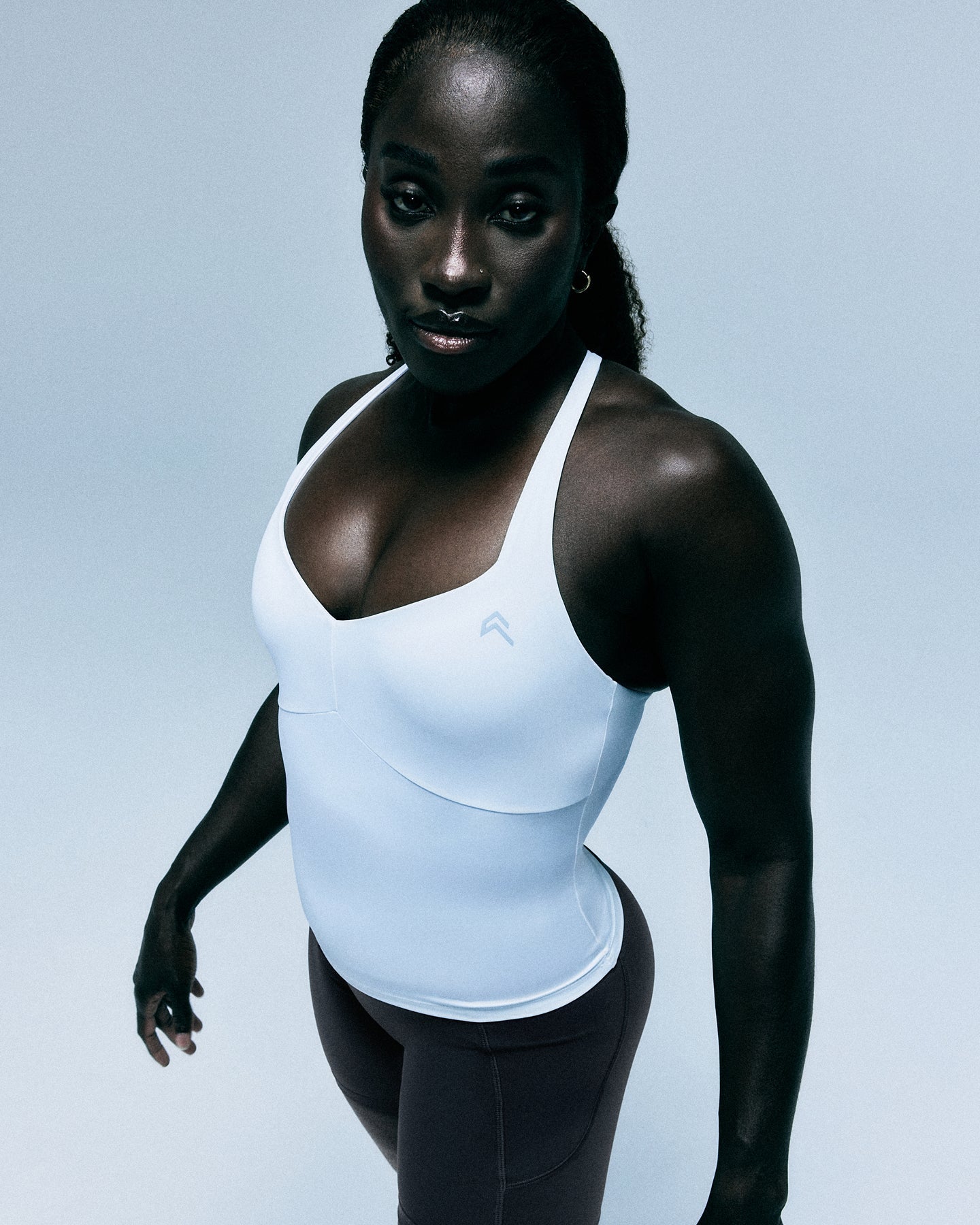 UnifiedMove™ T Back Mid Vest with Built in Bra Shelf with Reflective Logo | White