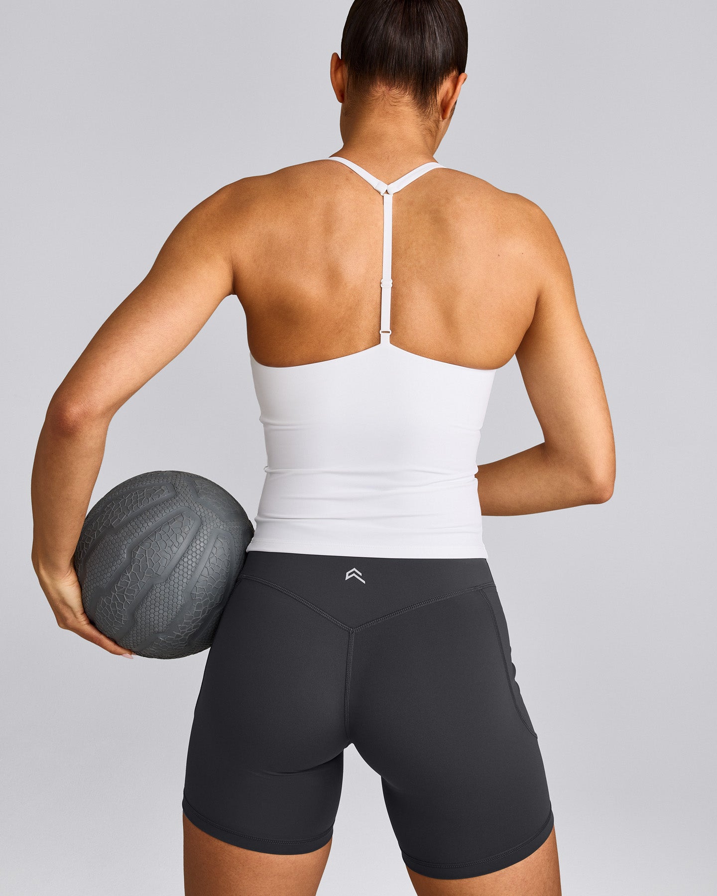 UnifiedMove™ T Back Mid Vest with Built in Bra Shelf with Reflective Logo | White