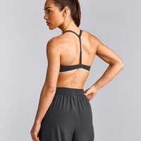 UnifiedMove™ T Back Minimal Bralette with Reflective Logo | Coal