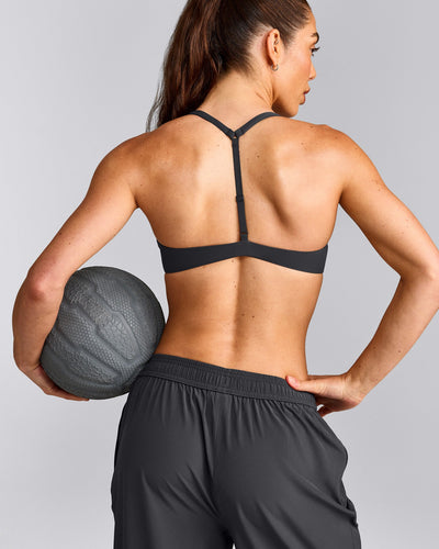 UnifiedMove™ T Back Minimal Bralette with Reflective Logo | Coal