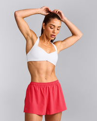 UnifiedMove™ T Back Minimal Bralette with Reflective Logo | White