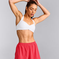 UnifiedMove™ T Back Minimal Bralette with Reflective Logo | White