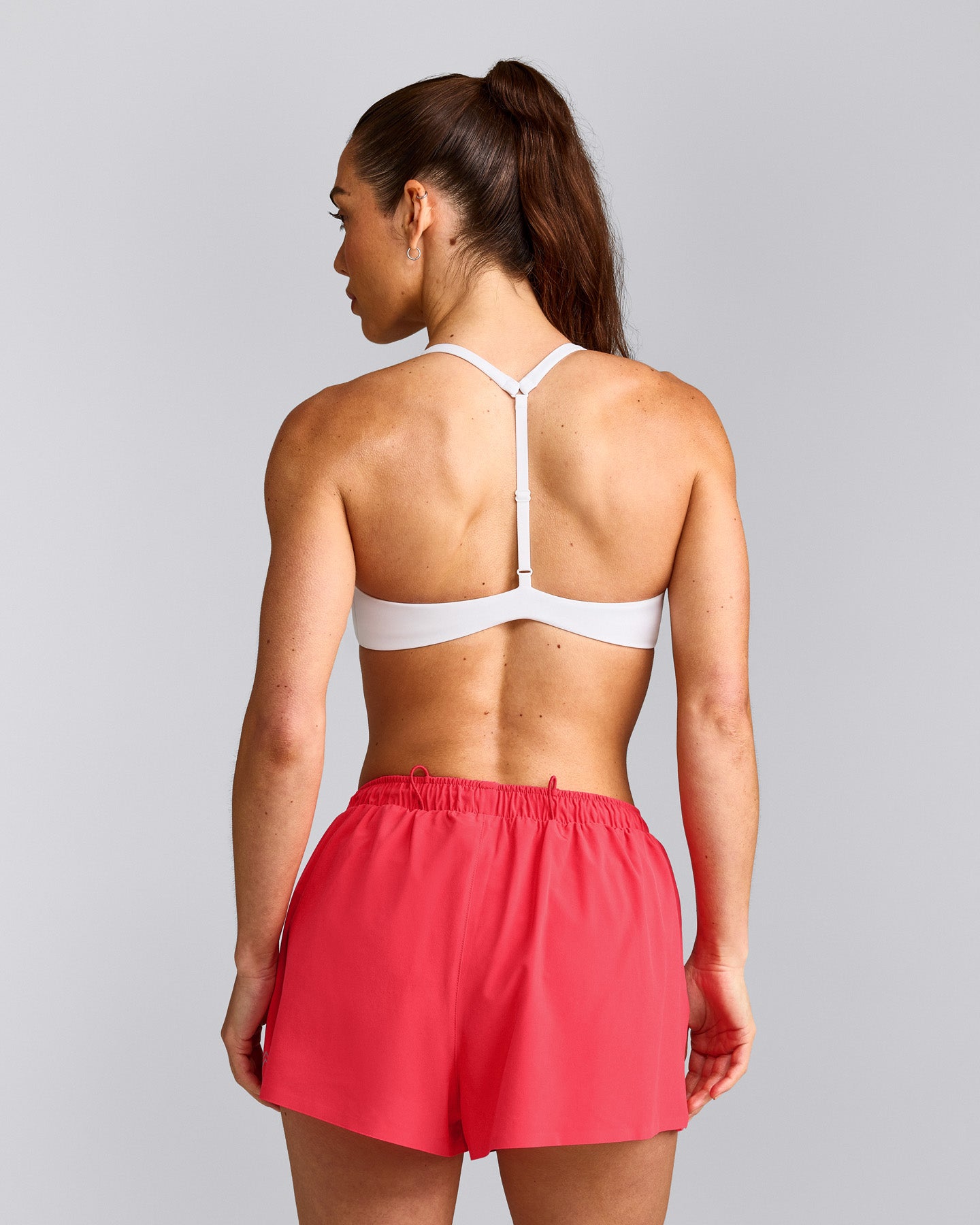 UnifiedMove™ T Back Minimal Bralette with Reflective Logo | White