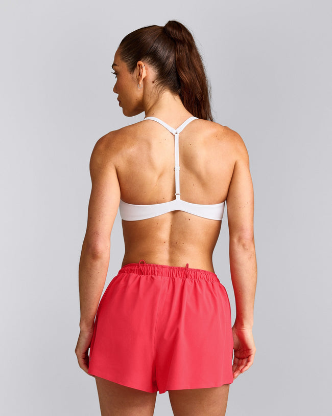 UnifiedMove™ T Back Minimal Bralette with Reflective Logo | White