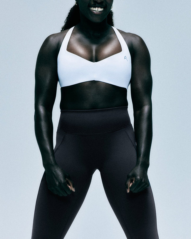 UnifiedMove™ T Back Minimal Bralette with Reflective Logo | White