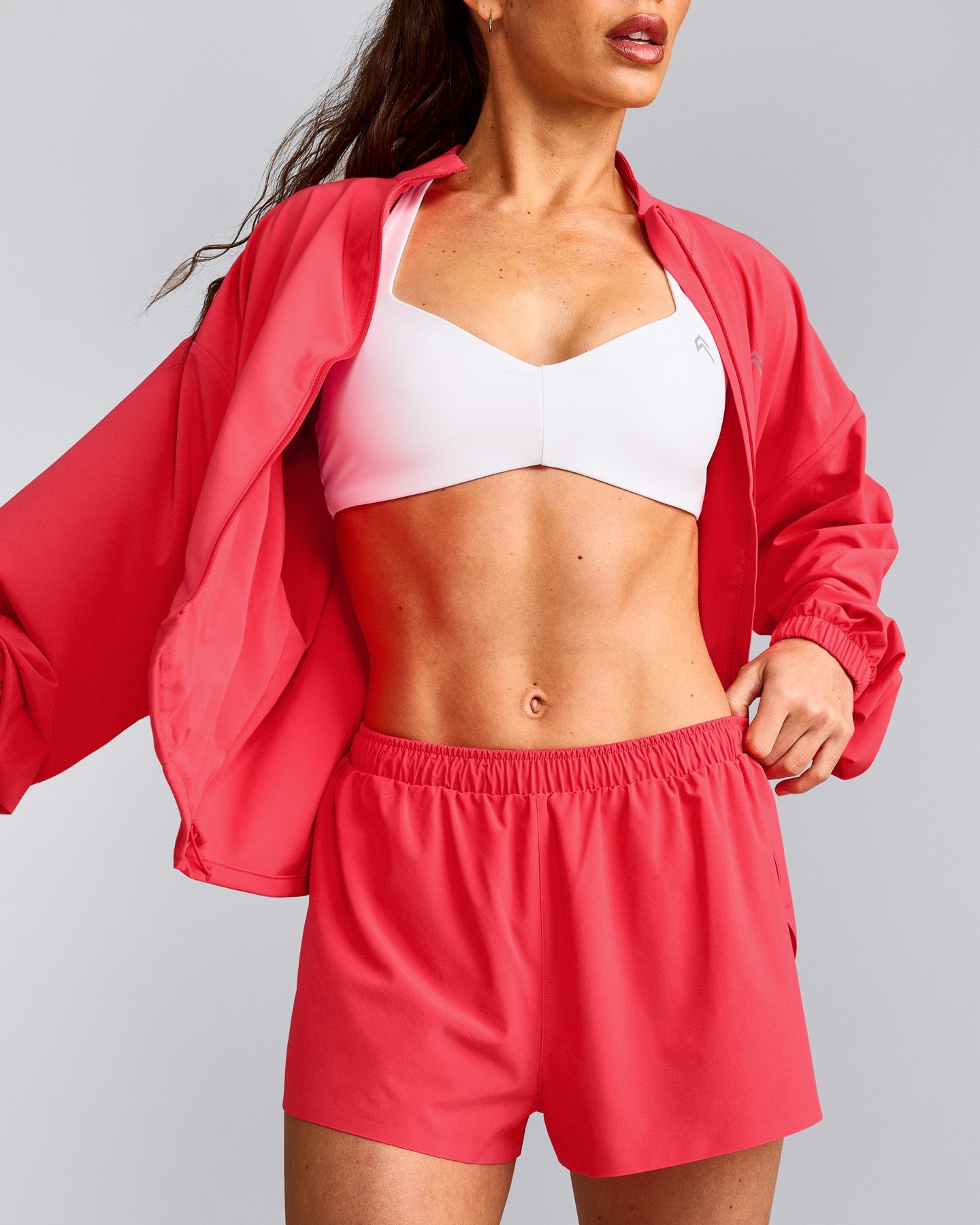 UnifiedMove™ T Back Minimal Bralette with Reflective Logo | White