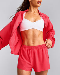UnifiedMove™ T Back Minimal Bralette with Reflective Logo | White