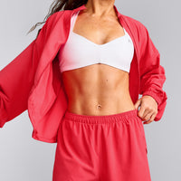 UnifiedMove™ T Back Minimal Bralette with Reflective Logo | White