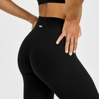 SoftMotion™ High Waisted Leggings with White Logo | Black