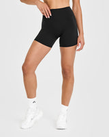 SoftMotion™ High Waisted Shorts 6" with White Logo | Black