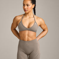 EnhanceLift™ Seamless Minimal Halter Neck Bralette with Grey Logo | Warm Minky