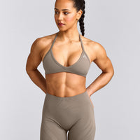 EnhanceLift™ Seamless Minimal Halter Neck Bralette with Gray Logo | Warm Minky