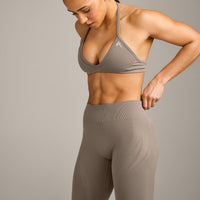 EnhanceLift™ Seamless Minimal Halter Neck Bralette with Grey Logo | Warm Minky