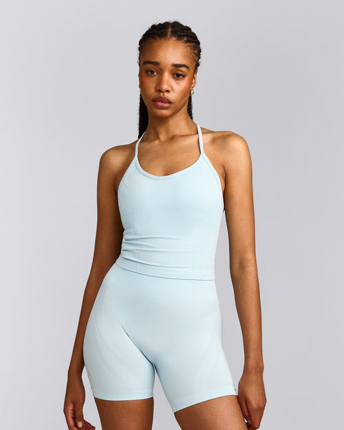 EnhanceLift™ Seamless Strappy Racer Tank Top with Built in Bra Shelf with Gray Logo | Cloud Blue