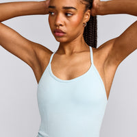EnhanceLift™ Seamless Strappy Racer Tank Top with Built in Bra Shelf with Gray Logo | Cloud Blue